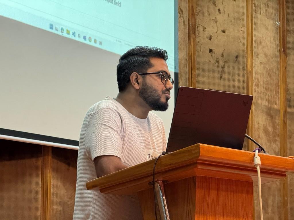 Abdullah Al Jahid speaking during a training session at Chaldal